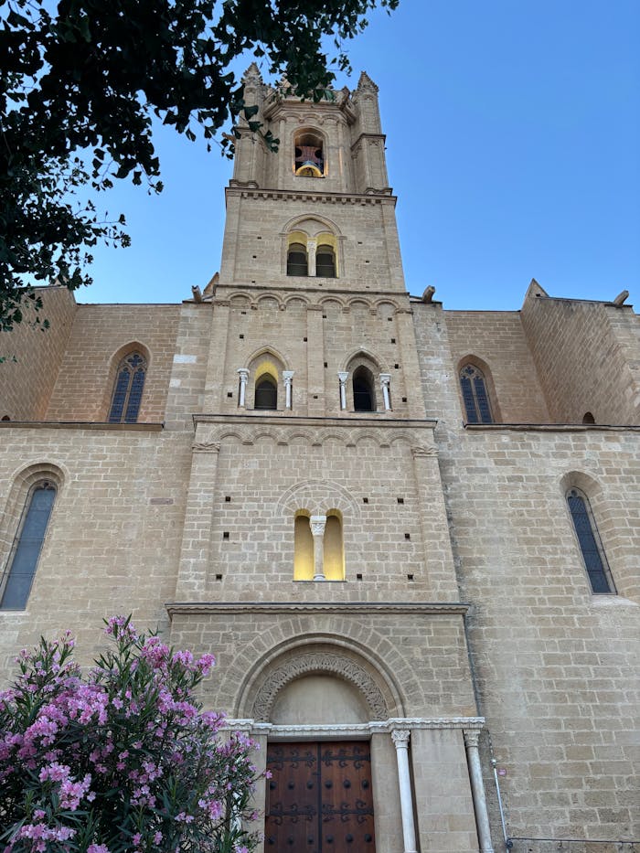 our-services-1 Majestic facade of Monreale Cathedral in Sicily captured at twilight.